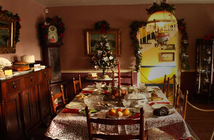 Image of the alms house dinning room decorated for Christmas
