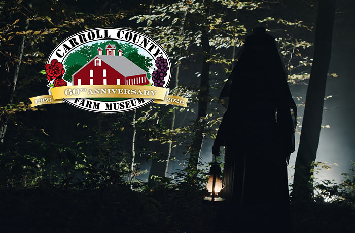 Image of a ghostly figure holding a lit lantern in the woods
